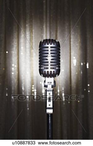 Old fashioned microphone in front of stage curtain View Large Photo Image Stock Image - Old fashioned microphone in front of stage curtain. Fotosearch