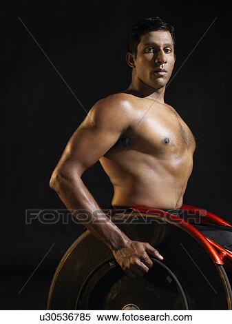 Stock Photography - Paraplegic cycler portrait. Fotosearch