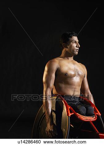 Stock Image - Paraplegic cycler. Fotosearch