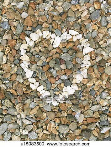 Pebbles stones heart (close-up) View Large Photo Image Stock Image - Pebbles stones heart (close-up). Fotosearch