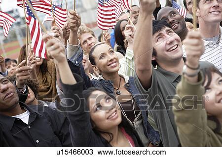 People holding up American Flags View Large Photo Image Stock Image - People holding up American Flags. Fotosearch
