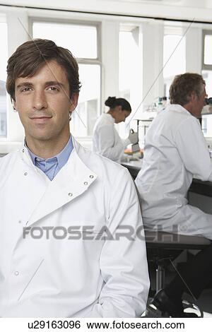 Stock Photograph - People in Laboratory. Fotosearch
