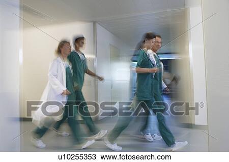 Physicians rushing through hospital Corridor side view motion blur View Large Photo Image Stock Image - Physicians rushing through hospital Corridor side view motion blur. Fotosearch