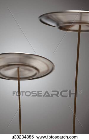 Stock Photography - Plates Spinning on Sticks. Fotosearch
