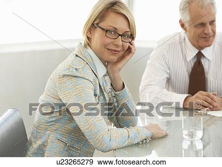 Portrait of confident businesswoman in meeting room View Large Photo Image Stock Photo - Portrait of confident businesswoman in meeting room. Fotosearch