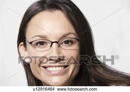 Portrait of woman wearing eyeglasses View Large Photo Image Picture - Portrait of woman wearing eyeglasses. Fotosearch