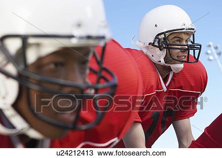 Quarterback waiting for snap on field close-up (close-up) View Large Photo Image Stock Image - Quarterback waiting for snap on field close-up (close-up). Fotosearch