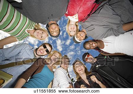 Stock Photography - Ring of friends outdoors (portrait). Fotosearch