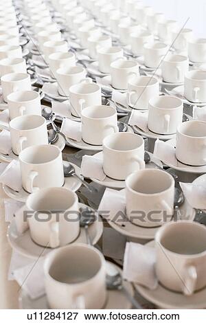 Rows of stacked teacups and saucers elevated view. View Large Photo Image Stock Photo - Rows of stacked teacups and saucers elevated view.. Fotosearch
