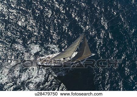 Sailboat on Ocean view from above View Large Photo Image Stock Image - Sailboat on Ocean view from above. Fotosearch