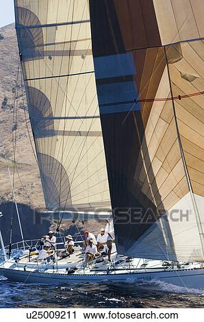 Sailors working on sailboat View Large Photo Image Stock Image - Sailors working on sailboat. Fotosearch