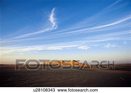Stock Image - Sand Dunes at sunset. Fotosearch