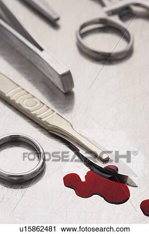 Scalpel with blood on tray View Large Photo Image Stock Image - Scalpel with blood on tray. Fotosearch