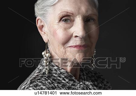 Senior Woman with Pearl Earrings View Large Photo Image Stock Image - Senior Woman with Pearl Earrings. Fotosearch