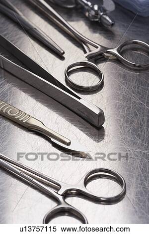Set of scissors and teasers close-up View Large Photo Image Stock Photography - Set of scissors and teasers close-up. Fotosearch