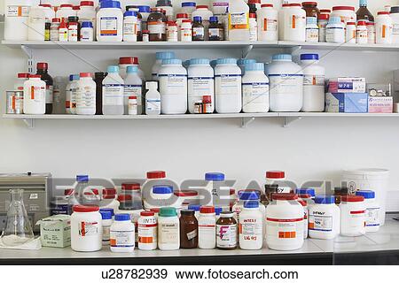 Stock Photo - Shelves full of medications. Fotosearch