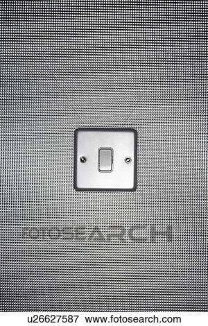 Silver light switch on wallpaper covered wall View Large Photo Image Stock Photo - Silver light switch on wallpaper covered wall. Fotosearch
