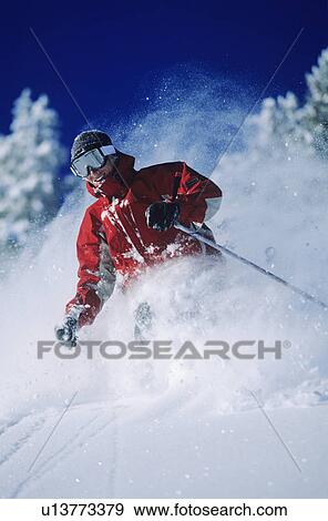 Skier in powder snow View Large Photo Image Stock Photo - Skier in powder snow. Fotosearch