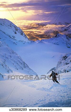 Skier on mountain slope View Large Photo Image Stock Photo - Skier on mountain slope. Fotosearch