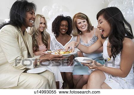 Smiling group of women enjoying bridal shower View Large Photo Image Stock Photography - Smiling group of women enjoying bridal shower. Fotosearch