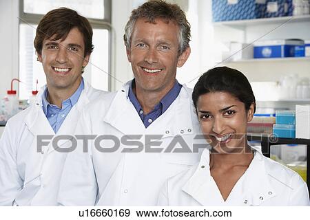 Smiling Lab Workers View Large Photo Image Stock Photo - Smiling Lab Workers. Fotosearch