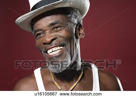 Smiling Man Wearing Fedora View Large Photo Image Stock Photo - Smiling Man Wearing Fedora. Fotosearch