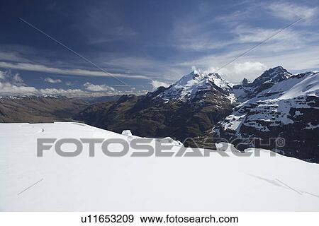Snow field and mountains View Large Photo Image Stock Photo - Snow field and mountains. Fotosearch
