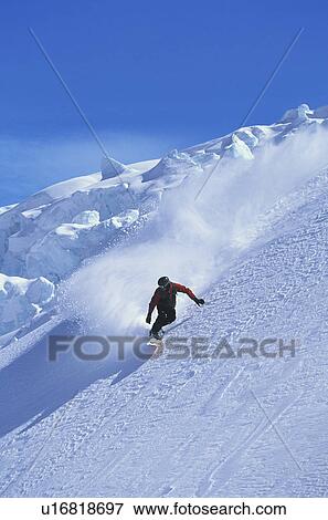 Snowboarder on mountain slope View Large Photo Image Stock Photo - Snowboarder on mountain slope. Fotosearch