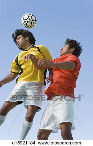 Soccer players competing for ball View Large Photo Image Picture - Soccer players competing for ball. Fotosearch