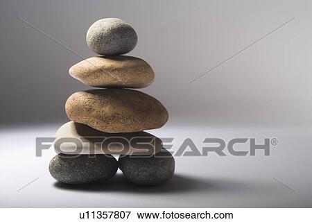 Stock Photo - Stack of balanced pebbles. Fotosearch