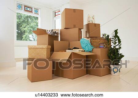 Stack of Boxes in New House View Large Photo Image Stock Image - Stack of Boxes in New House. Fotosearch