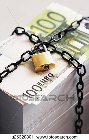 Stock Image - Stack of Euros secured by padlock and chain. Fotosearch