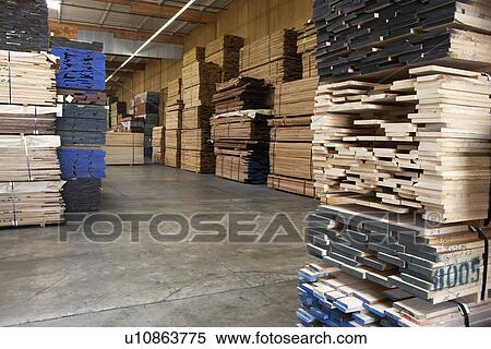 Stacks of wood in warehouse View Large Photo Image Stock Photography - Stacks of wood in warehouse. Fotosearch