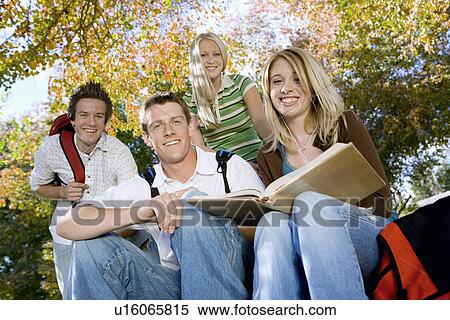 Students studying outdoors (portrait) View Large Photo Image Stock Photography - Students studying outdoors (portrait). Fotosearch
