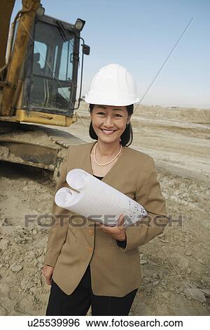 Surveyor on Construction Site View Large Photo Image Stock Photograph - Surveyor on Construction Site. Fotosearch