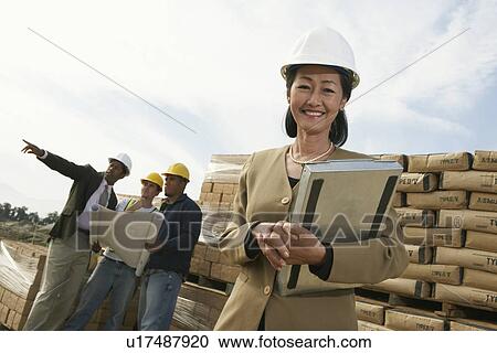 Surveyors on Construction Site View Large Photo Image Stock Image - Surveyors on Construction Site. Fotosearch