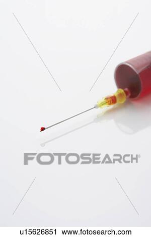 Syringe filled with blood close-up View Large Photo Image Stock Image - Syringe filled with blood close-up. Fotosearch