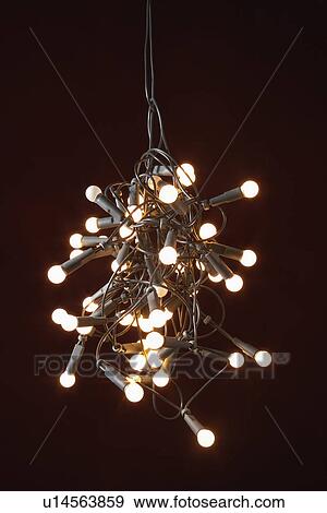 Stock Photo - Tangled lights on black background. Fotosearch