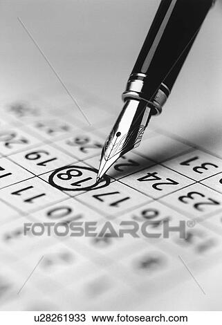 Tip of fountain pen marking date in calendar (b&w) (close-up) View Large Photo Image Stock Image - Tip of fountain pen marking date in calendar (b&w) (close-up). Fotosearch