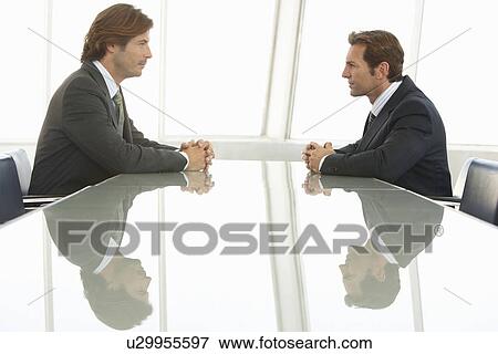 Stock Photo - Two Businessmen in Meeting. Fotosearch