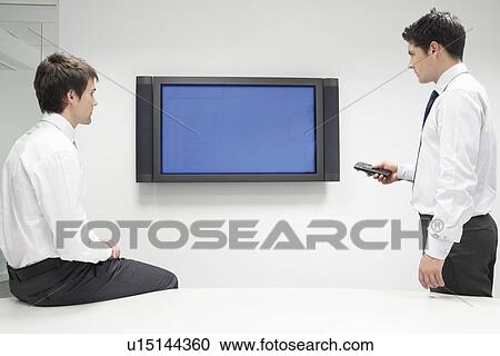 Two Businessmen Using Flat Panel Monitor View Large Photo Image Stock Image - Two Businessmen Using Flat Panel Monitor. Fotosearch