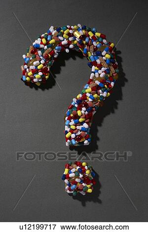 Stock Photo - Various pills forming question mark on black background. Fotosearch