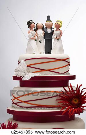 Stock Photography - Wedding Cake with Funny Figurines. Fotosearch