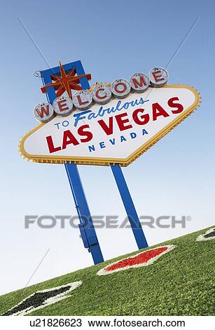 Welcome to Las Vegas sign with playing card suits in grass View Large Photo Image Stock Image - Welcome to Las Vegas sign with playing card suits in grass. Fotosearch