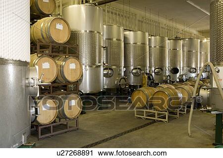 Wine barrels in winery View Large Photo Image Stock Image - Wine barrels in winery. Fotosearch