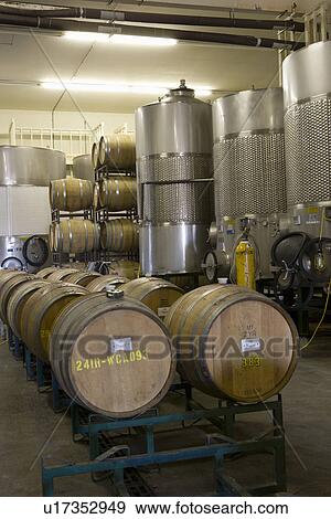 Wine barrels in winery View Large Photo Image Stock Photo - Wine barrels in winery. Fotosearch