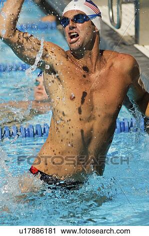 Stock Image - Winning Swimmer. Fotosearch