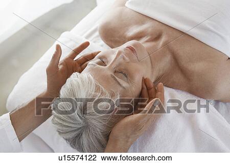 Woman Receiving a Massage head and shoulders View Large Photo Image Stock Image - Woman Receiving a Massage head and shoulders. Fotosearch