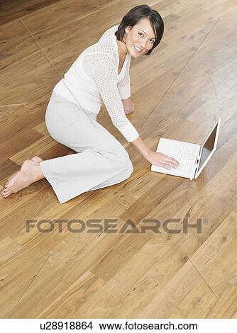 Woman Using Laptop View Large Photo Image Picture - Woman Using Laptop. Fotosearch