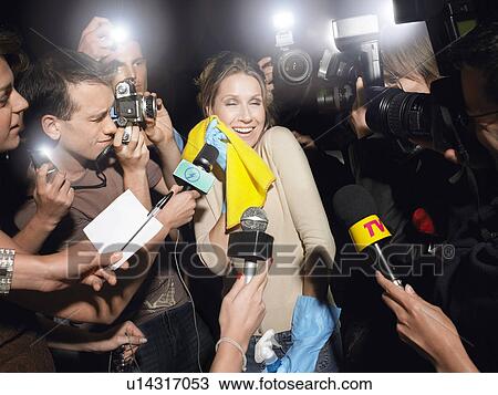 Woman with cleaning equipment surrounded by paparazzi View Large Photo Image Stock Image - Woman with cleaning equipment surrounded by paparazzi. Fotosearch